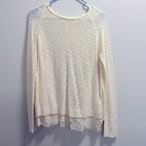 Cream /off white colored blouse with open lace backing and lace bottom
